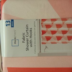 Fabric shower curtain with hooks